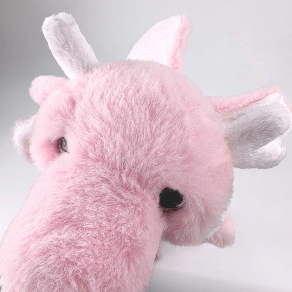 可愛いピンクのドラゴンのぬいぐるみ