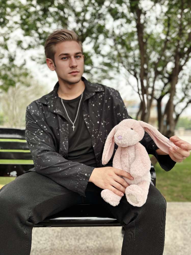 かわいいピンクのダスティローズウサギぬいぐるみ