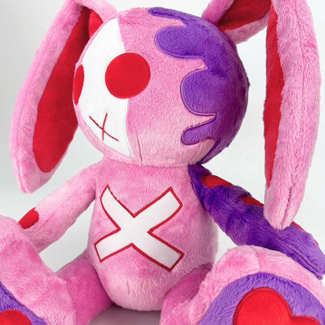 ムーディーな紫色のバラゴスバニーぬいぐるみ