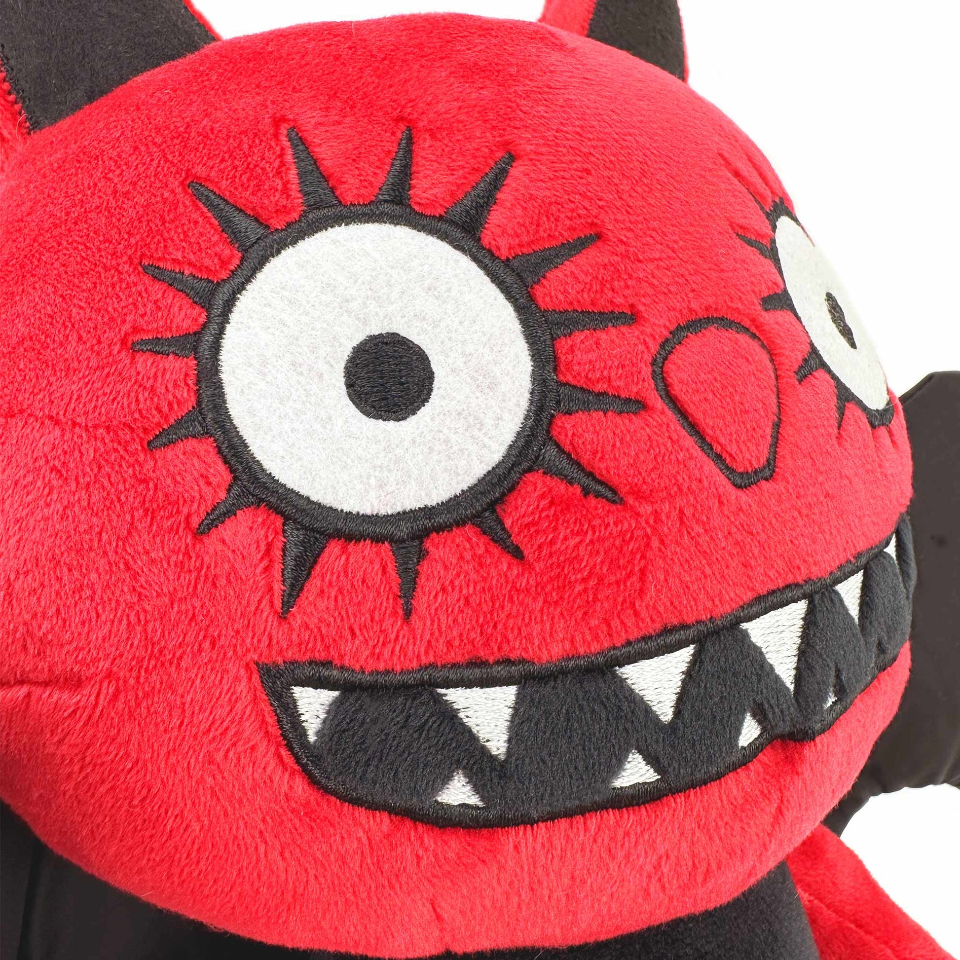 ゴス風の赤と黒のドラゴンぬいぐるみ